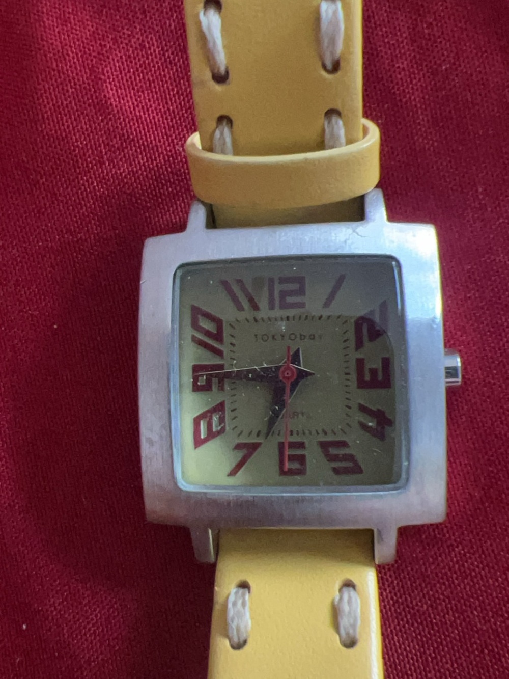 TOKYObay "Tram" model wristwatch featuring a distinct yellow leather band